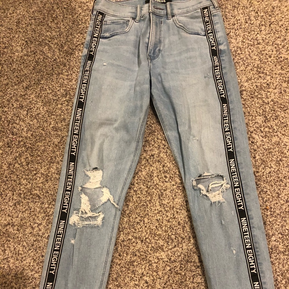 Express straight jeans with rips and writing